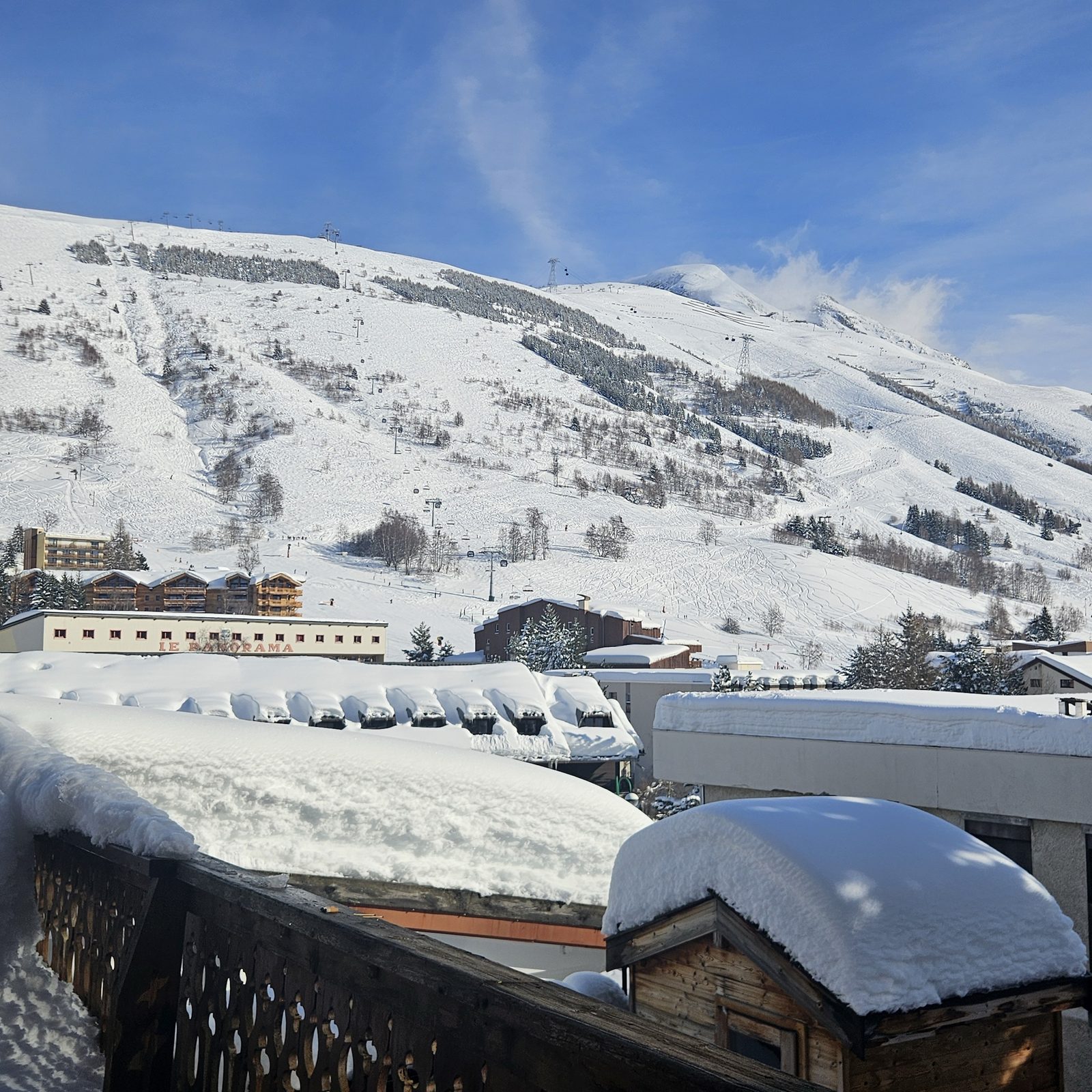 The slopes and the lifts seen from the chalet balcony